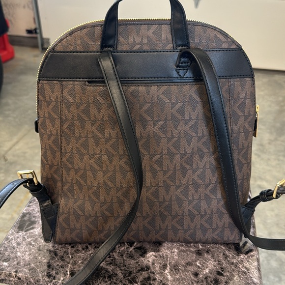 Brown and black Michael Kors Dallas slim backpack - Picture 2 of 6